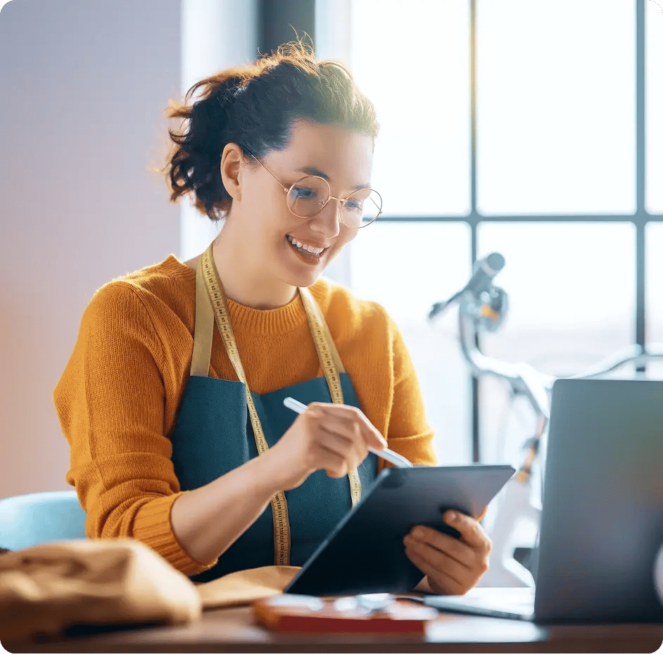 Small business owner managing orders