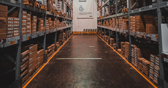 boxes of inventory sitting on the shelves in a warehouse